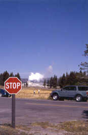 A view of a Castle Geyser eruption from the Old Faithful gas station